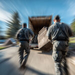 The Trash Bandits team performing a same day junk removal shreveport, quickly loading furniture onto their truck.